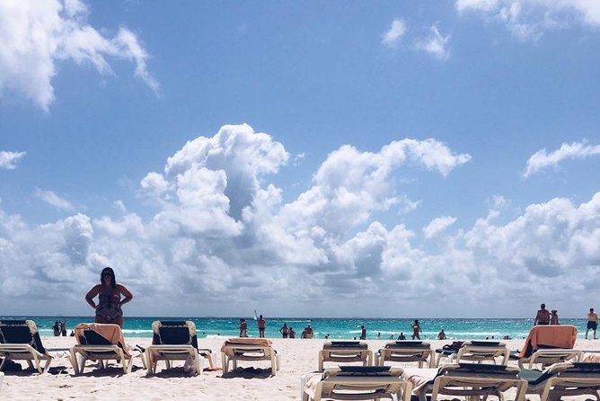 Live this unique experience. Catamaran to Isla Mujeres Tour. Open Bar included. - Key Points