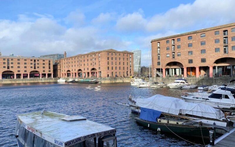 Liverpool: City Walking Tour & Exploration Game - Exploring the Business District and Iconic Streets