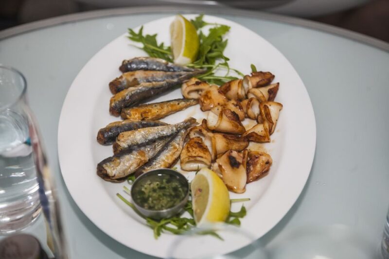 Ljubljana: Slovenian Cuisine Walking Tour with Tastings - Exploring Ljubljana’s Old Town and Modern Centre