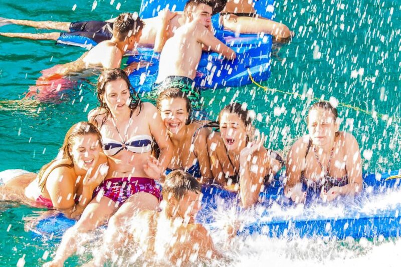 Lloret de Mar: Catamaran Sailing Cruise with BBQ and Drinks - The Stop for Swimming, Snorkeling, and Water Fun