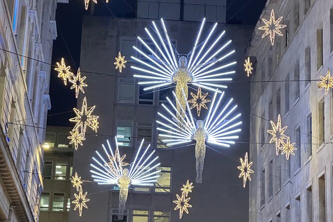 London Christmas Lights Guided Tour With Christmas Music - Cecil Court’s Historic Charm and Magical Decorations