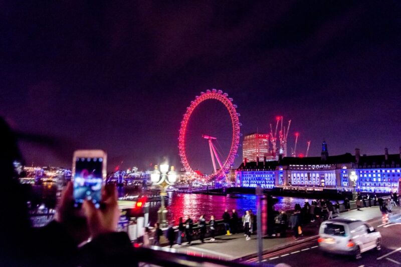 London: Nighttime Open-Top Sightseeing Tour with Live Guide - The Guide Experience: Entertaining and Informative