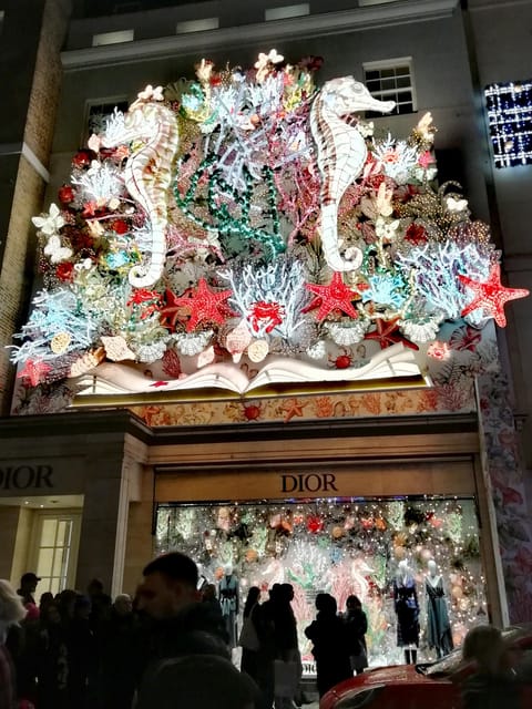 London: Private Festive lights walking tour with a local - Visiting Burlington Arcade and the Festive Atmosphere of Seven Dials