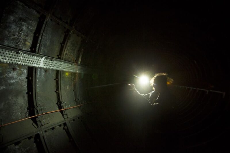 London: The Lost Tunnels of Euston Station Guided Tour - Standing at the Edge of the Victoria Line Ventilation Shaft