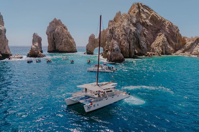 Los Cabos Private Catamaran Sunset Cruise with Snacks & Open Bar - The Scenic Stops: El Arco, Lovers Beach, and Lands End