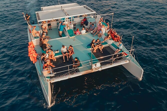 Los Cabos Sunset Catamaran Cruise with Open Bar & Light Snack - An Unforgettable Sunset Sail in Los Cabos for $85