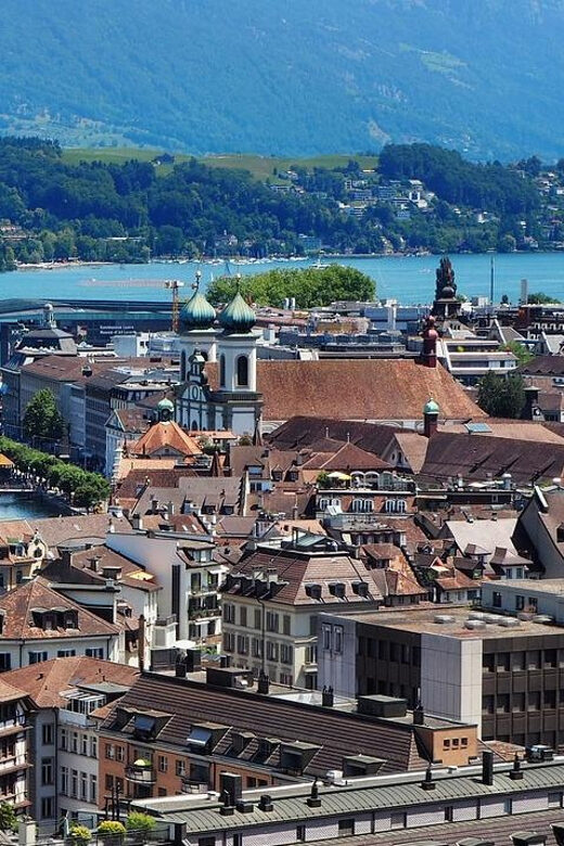 Lucerne: Interlaken & Grindelwald Exclusive Private Day Tour - Discover Interlaken’s Vibrant Town Center and Lakeside Views
