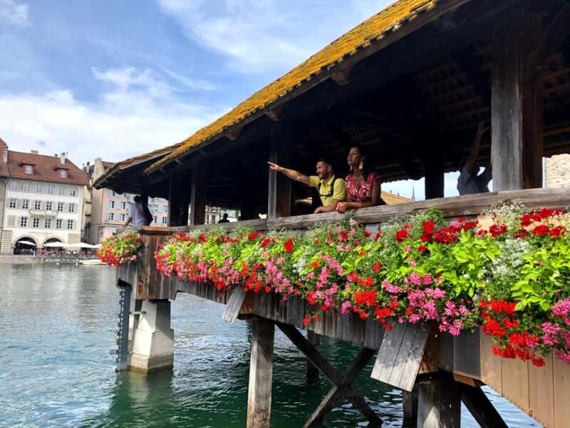Lucerne: Private Walking Tour with Wine Tasting - Walking Through Lucerne’s Iconic Old Town