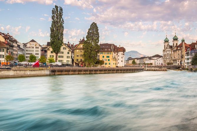 Lucerne Walking & Boat Tour: The Best Swiss Experience - Climbing the Nine Towers and Learning About the City’s Defenses