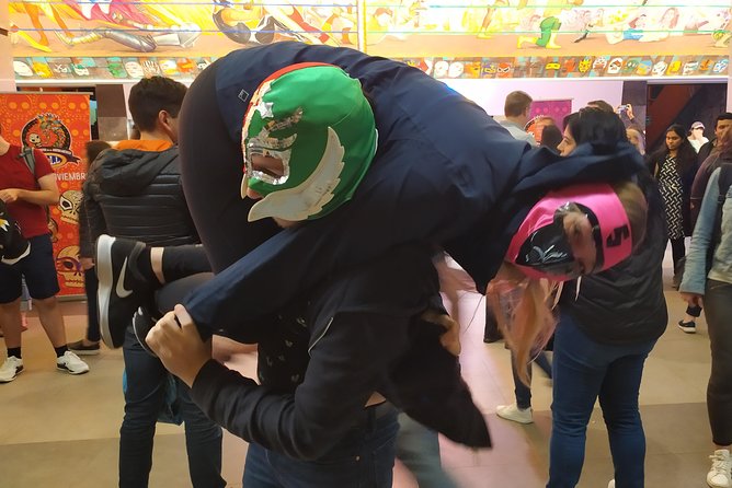 LUCHA LIBRE experience created by real fans with TACOS and MEZCAL - Practical Details: Meeting Points, Group Size, and Safety Tips