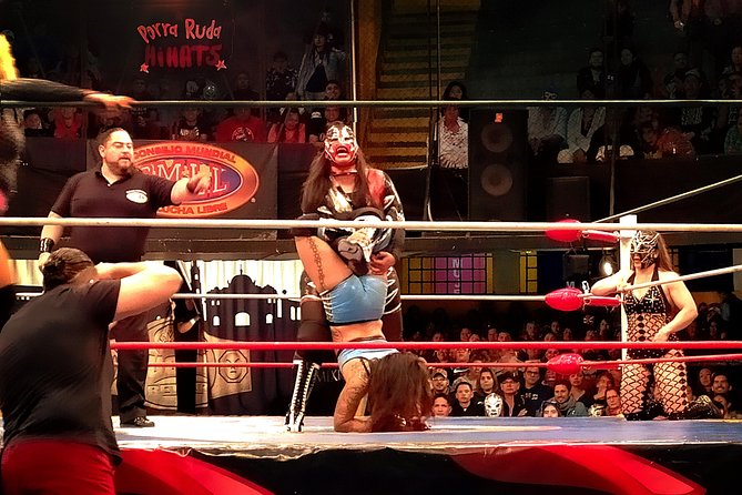 Lucha Libre wrestling show, tacos and beer with artist - Starting Point at Mercado La Ciudadela for Tacos and Beverages