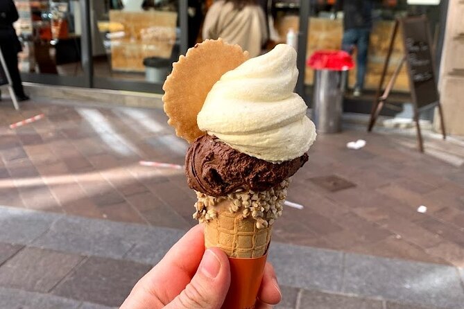 Lugano Food Tour - Admiring the Romanesque Facade of Cattedrale di San Lorenzo