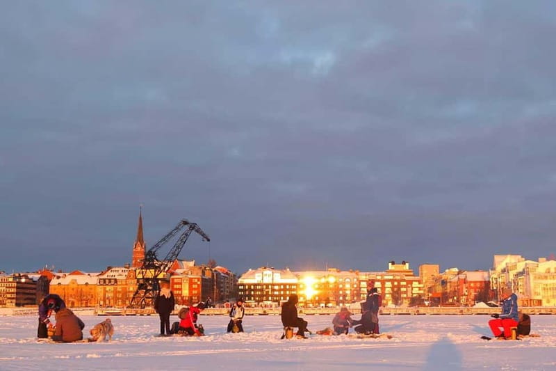 Lulea: Ice Fishing Tour in the heart of the city with Guide - Cozy Comforts on the Ice with Reindeer Furs and Hot Drinks
