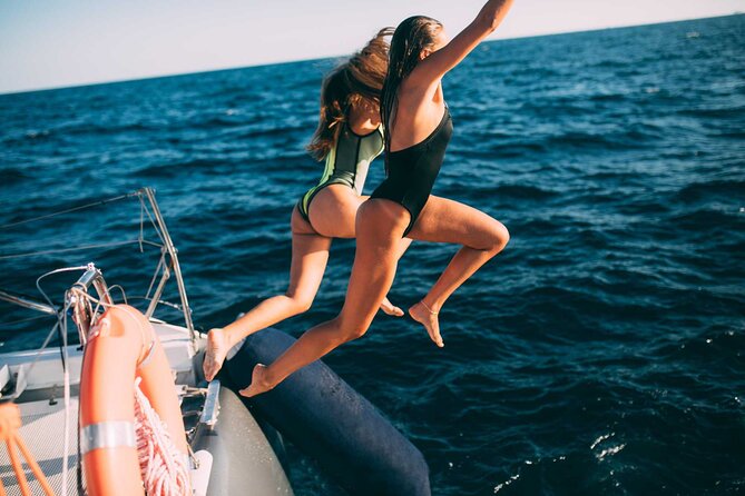 Luxury Catamaran Cruise with Brunch and Unlimited Drinks - The Return Journey and Coastal Views