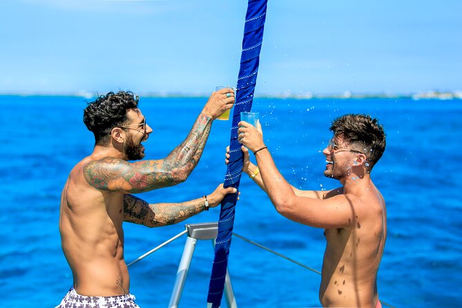 Luxury Catamaran to Isla Mujeres, Snorkeling, Buffet and Ice Bar - Snorkeling at Arrecife El Meco: Marine Life and Reef Exploration