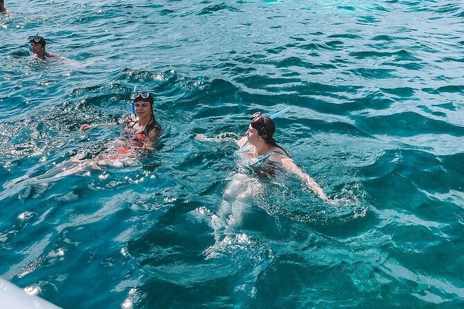 Luxury Catamaran to Isla Mujeres, Snorkeling, Buffet and Ice Bar - Practicalities: What’s Included and Fees to Remember