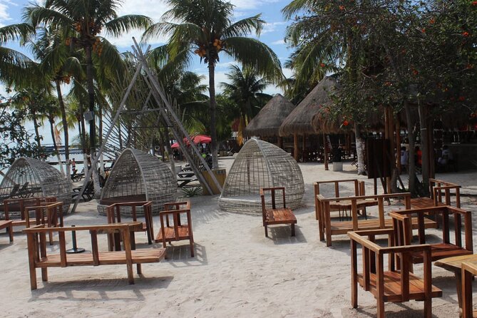 Luxury Catamaran Tour to Isla Mujeres with Transportation - Relaxing at Playa Norte Beach