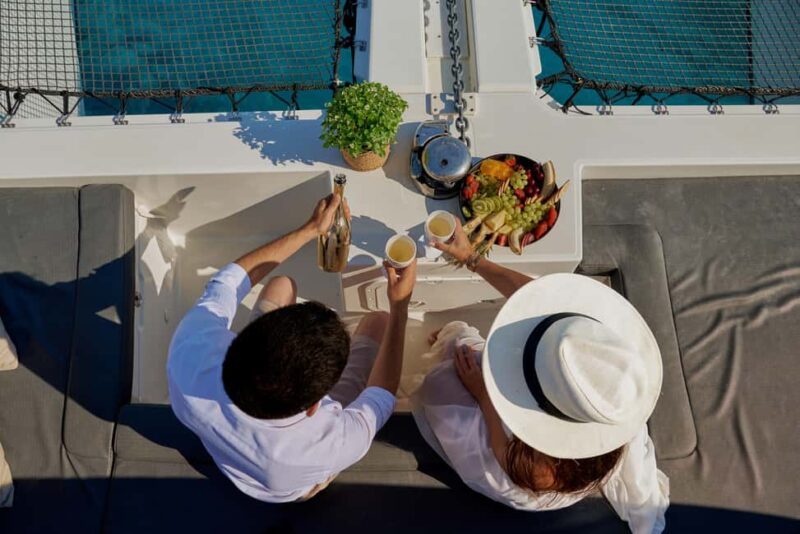 Luxury Dia Catamaran Cruise: Chef Dinner, Drinks & Sunset - Gourmet Lunch Crafted with Local Ingredients