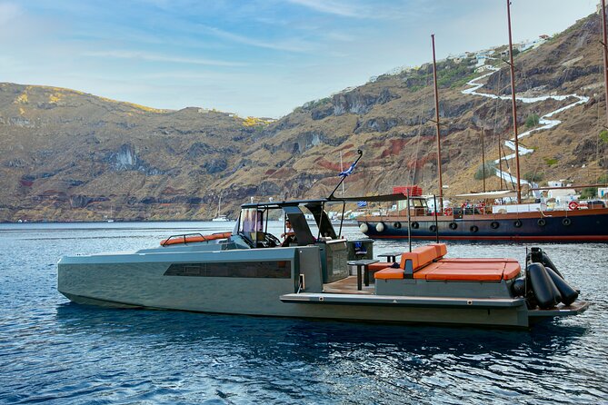 Luxury Private Power Catamaran Tour in Santorini - Activities and Sights: Volcanoes, Caves, and Secluded Beaches
