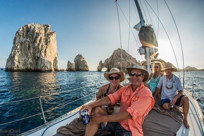 Luxury Sailboat Tour at Sunset in Los Cabos + Snacks + Premium Drinks - Scenic Coastal Sailing and Iconic Landmarks