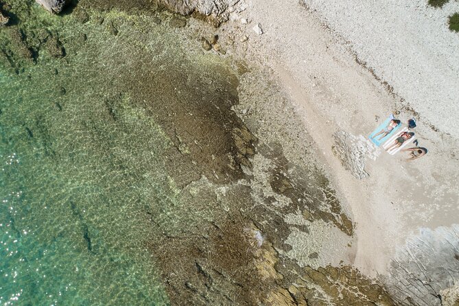 Luxury Speedboat Island Hopping with Swimming & Snorkeling - Sunbathing and Relaxing at Figarola Island