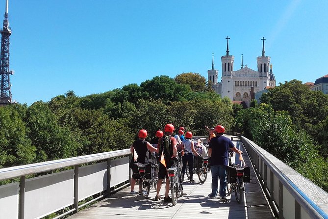 Lyon Electric Bike Tour including Food Tasting with a Local Guide - The Tunnel de la Croix-Rousse and Hilltop Views