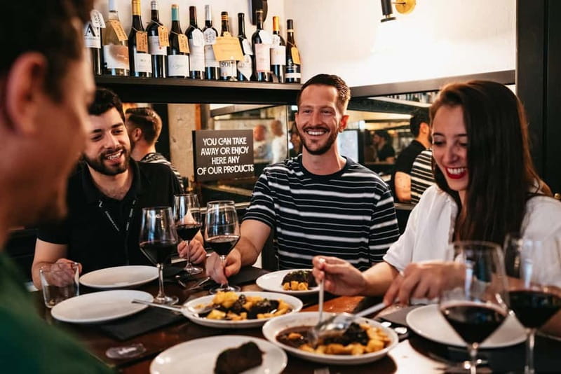Madrid: Guided Tapas and Wine Tour with Rooftop Views - Exploring Madrids Culinary Neighborhoods