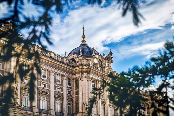 Madrid Highlights & Royal Palace Private Tour with Hotel pick up - Exploring Madrid’s Main Squares: Plaza Mayor and Puerta del Sol