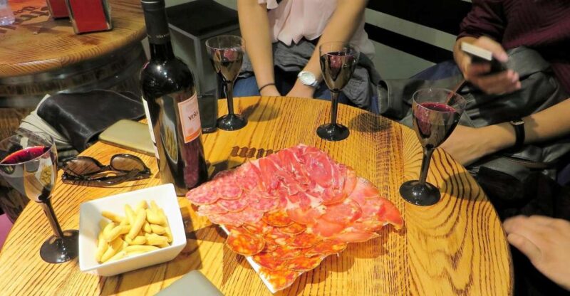 Madrid: Iberico Ham and Spanish Wine Small-Group Food Tour - Discover Madrid’s Local Jamonerías and Their Secrets