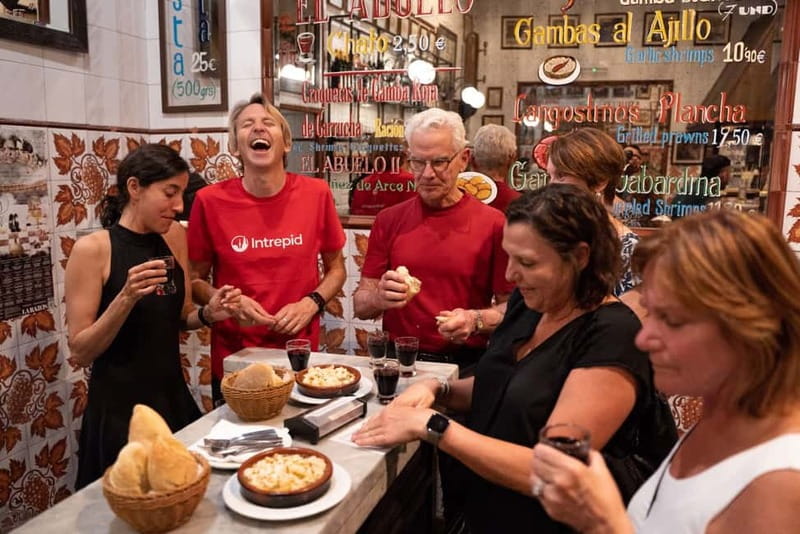 Madrid: Local Tapas, Drinks, and Hidden Gems Walking Tour - Strolling Through La Latina for Local Liquor and Chorizo