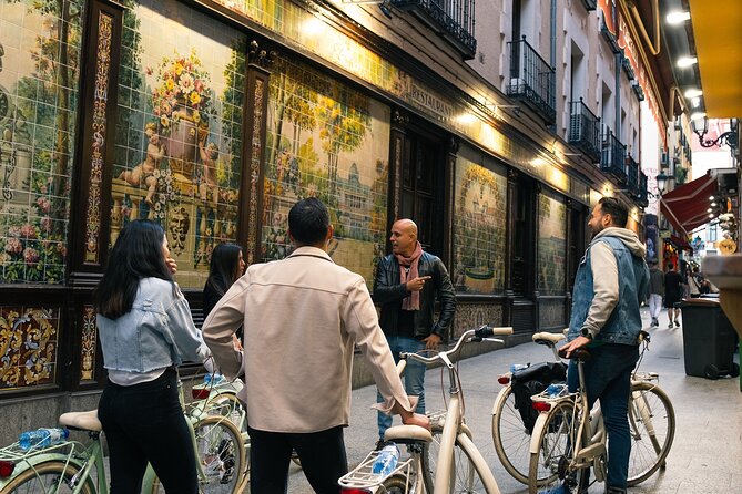 Madrid Night: Vintage Bike Tour Highlights with Optional Tapas - The Royal Palace and Its Nighttime Glow