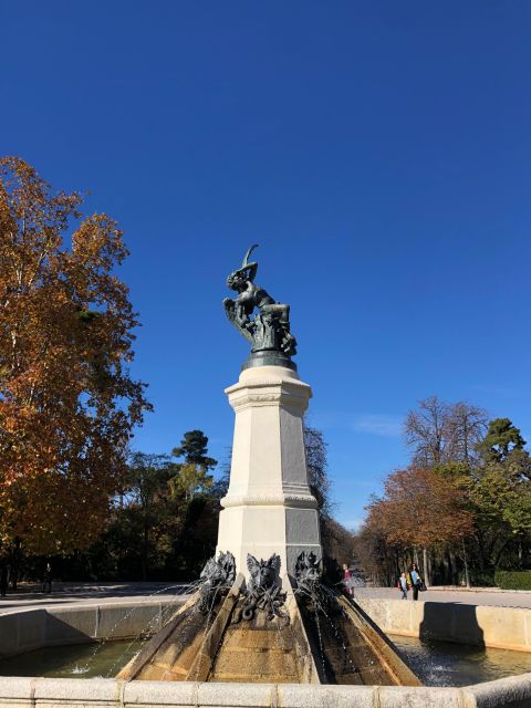 Madrid: Prado Avenue and Retiro Park Guided Walking Tour - Ending at the Magnificent Puerta de Alcalá