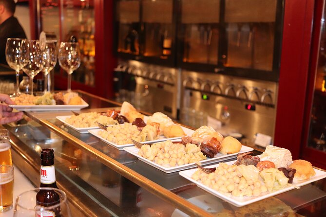 Madrid Small Group Tapas Tour at 4 Venues -Lunch or Dinner - The Guides Role in Enhancing the Experience