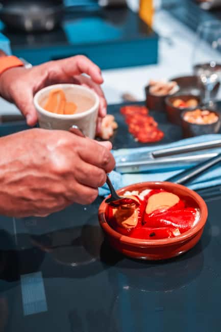Madrid: Tapas Cooking Class with bottomless Wine Pairing - Authentic Madrid Tapas Cooking Experience with Unlimited Spanish Wine