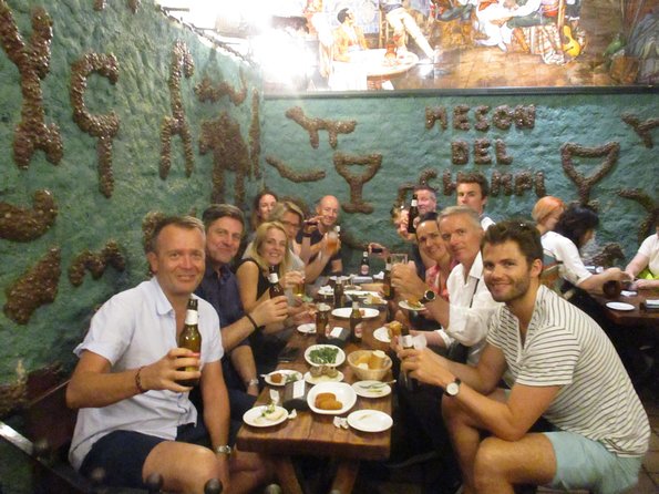 Madrid Tapas & Drinks: A Small Group Culinary Adventure - Visiting Plaza Mayor: Madrid’s Iconic Main Square