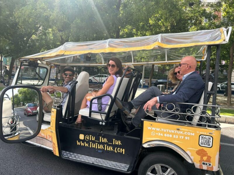 Madrid: Traditional Tour wh Private guide in yellow Tuk Tuk - Exploring Madrids Iconic Landmarks in a Compact Tour