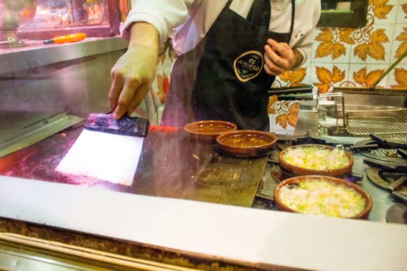 Madrid: Wine and Tapas Walking Tour - Discovering Hidden Corners of Madrid