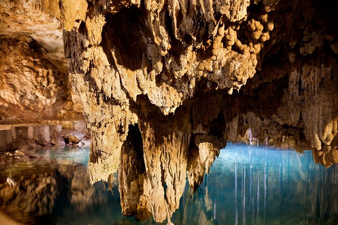 Magical adventure to Tulum, a giant sculpture and cenotes. Lunch included - Exploring Tulum’s Archaeological Site with a Certified Guide
