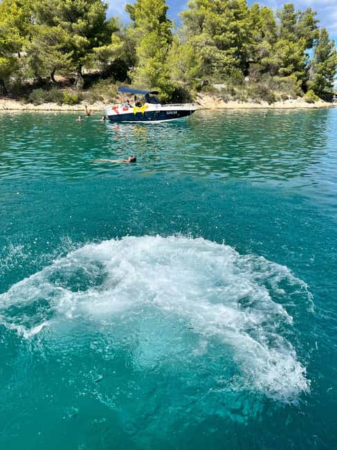 Magnific blue lagoon, speed boat water, wine&towels included - Floating in the Blue Lagoon’s Emerald Waters