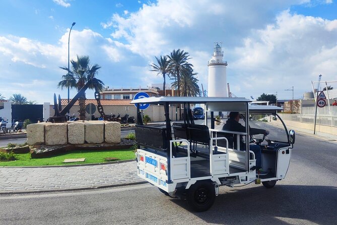 Malaga by Tuk Tuk i : 1 or 2 hours Private city tour - The Iconic La Farola Lighthouse and Its Engineering