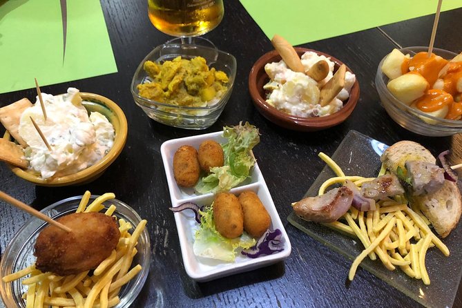 Malaga Food Tour: Tapas, Drinks and Delights with a Local - Key Points
