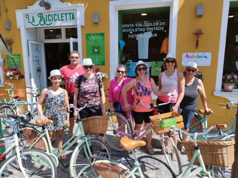 Malaga: Guided Bike Tour - Visiting Muelle Uno and La Farola Lighthouse