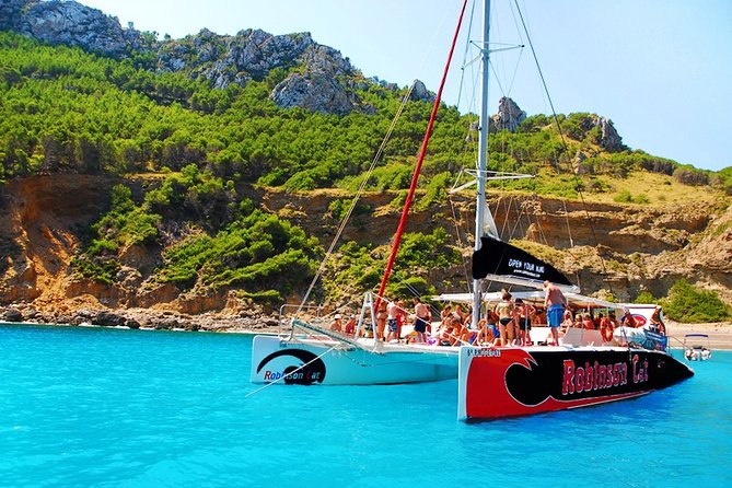 Mallorca Catamaran Tour in the Bay of Pollensa - Departing from Port de Pollensa at the Start of the Day