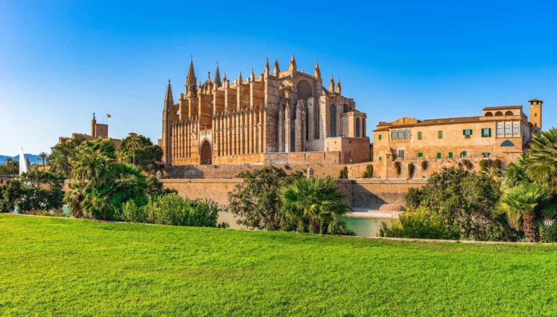 Mallorca: Cathedral tour, views of Bellver Castle, and ensaïmada - Walking Through Palma’s Historic Old Town