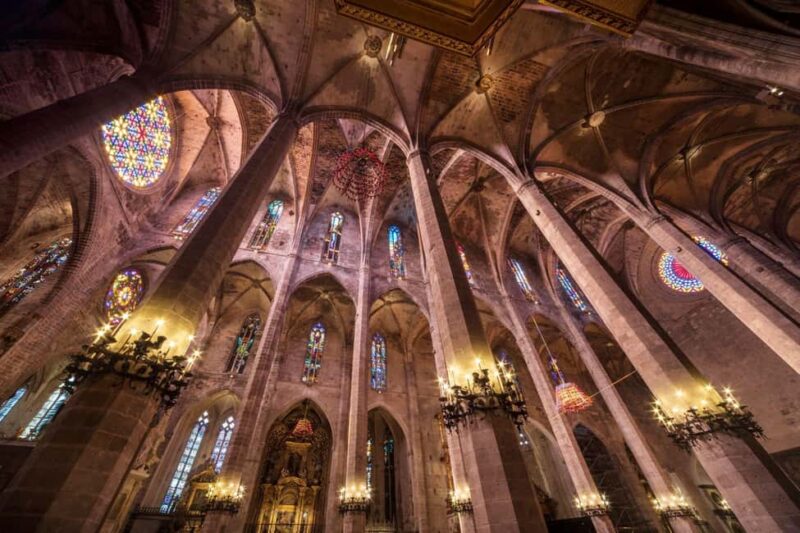 Mallorca: Cathedral tour, views of Bellver Castle, and ensaïmada - The Lively Plaza Mayor and Courtyard Visits