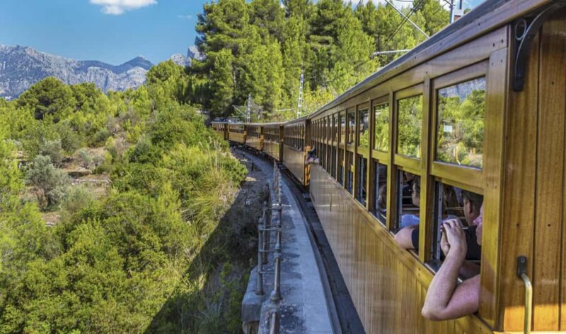 Mallorca Island Tour with Boat, Train, Tram and Bus - Visiting Lluc Monastery in the Tramuntana Mountains