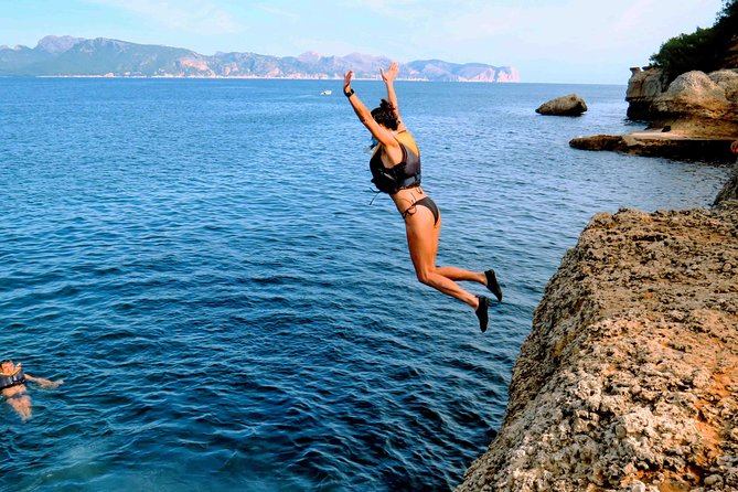 Mallorca: Kayaking, Sea Cave, Cliff Jumping & Snorkel Tour - Coastal Trek and Cliff Jumping Highlights