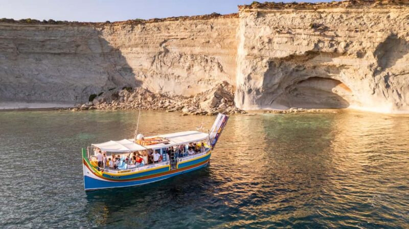 Malta: Sunset Boat Tour to St. Peters Pool and South Coast - Historic Salt Pans and the Marsaxlokk Lighthouse