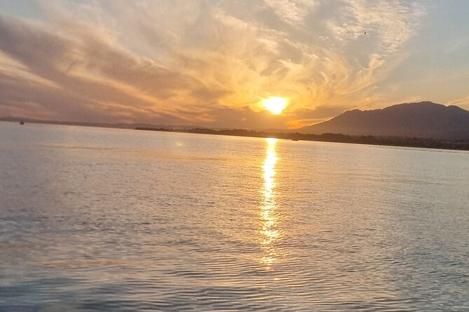 Marbella- sunset from a sailboat with drinks - Key Points
