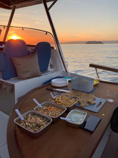 Marseille: Sunset Boat Cruise with Buffet and Organic wine - Swimming and Snorkeling at the Frioul Islands